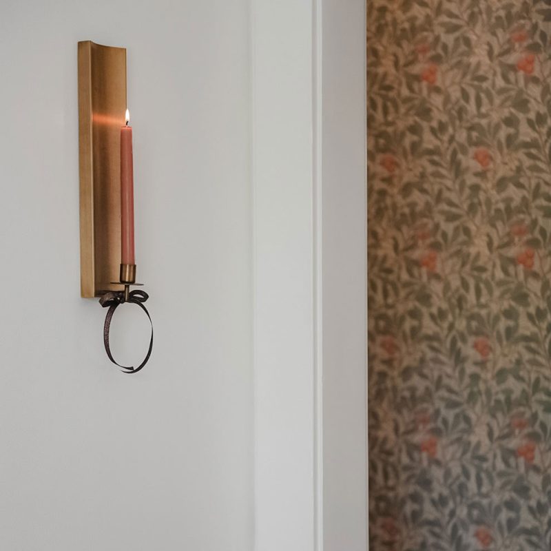 long brass candle sconce